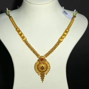 Woman wearing a Gold Chakra Pendant Necklace